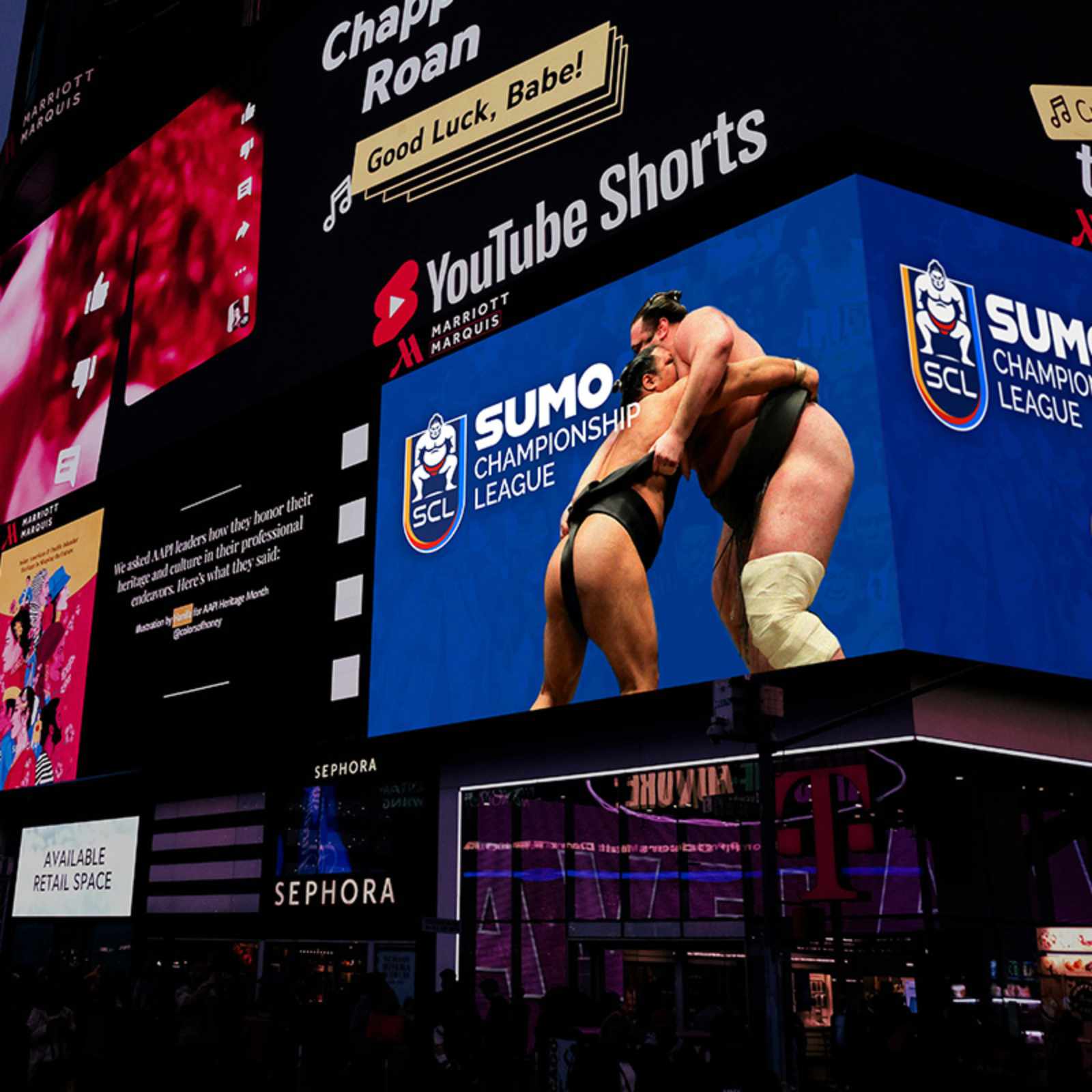 Two sumo wrestlers grappling on screen at Sumo Championship League.